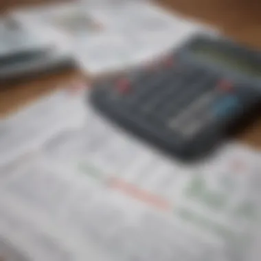 A calculator and budgeting sheets on a table